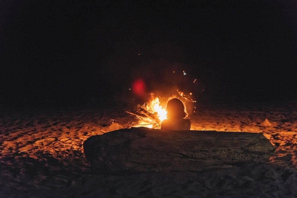 a camp fire showing the calm vibe in spiritual retreats