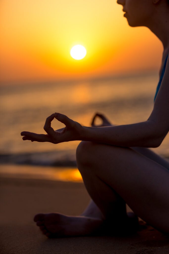 a woman meditating during one of our guided meditation sessions